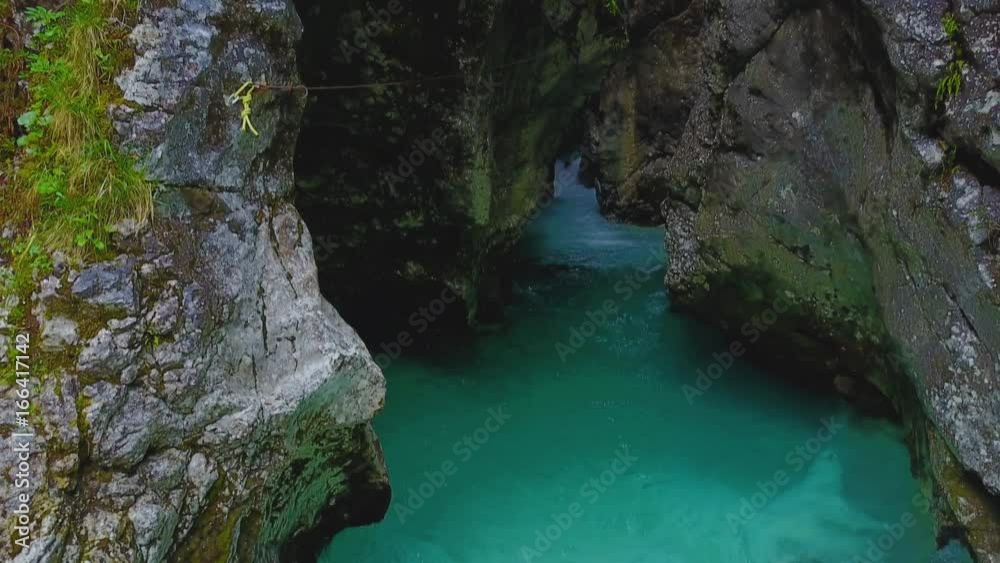 Aerial: Beautiful Turquoise Mountain River Running Through The Rocky Valley Aerial: Beautiful Turquoise Mountain River Running Through The Rocky Valley