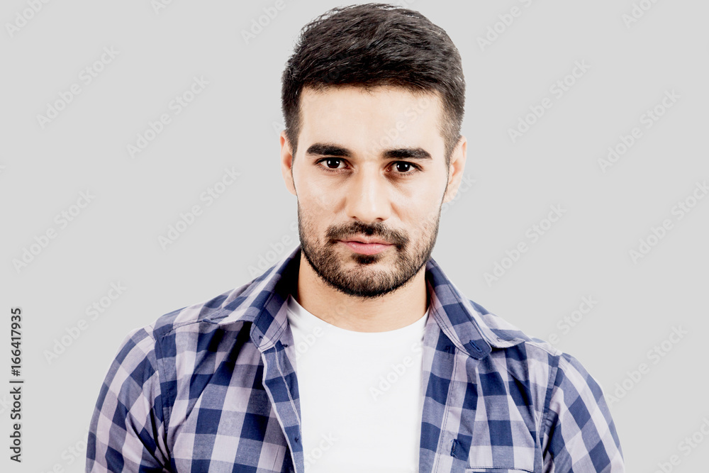 Portrait of handsome man on gray background Portrait of handsome man on gray background