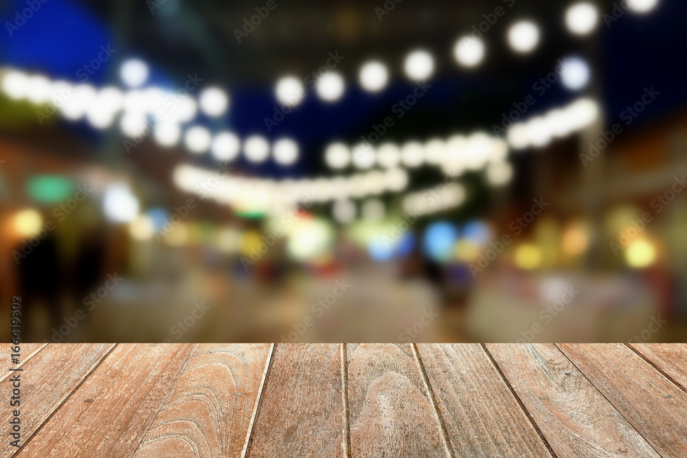 Empty Wooden Table Board with Blurred Restaurant Background. Empty Wooden Table Board with Blurred Restaurant Background.