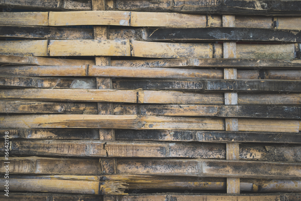 Full Frame Shot Of Weathered Bamboo Fence.