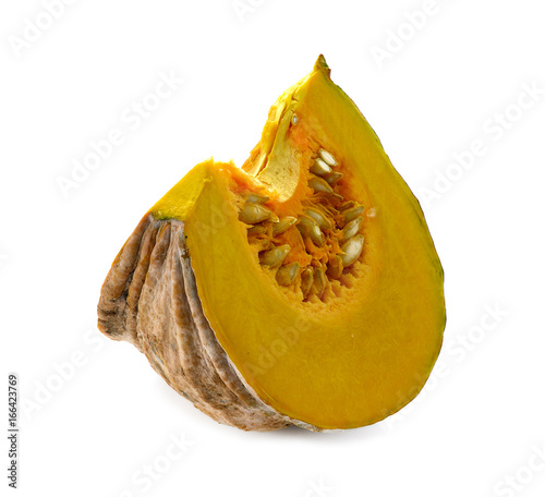 Piece of ripe pumpkin. Isolated on white background.