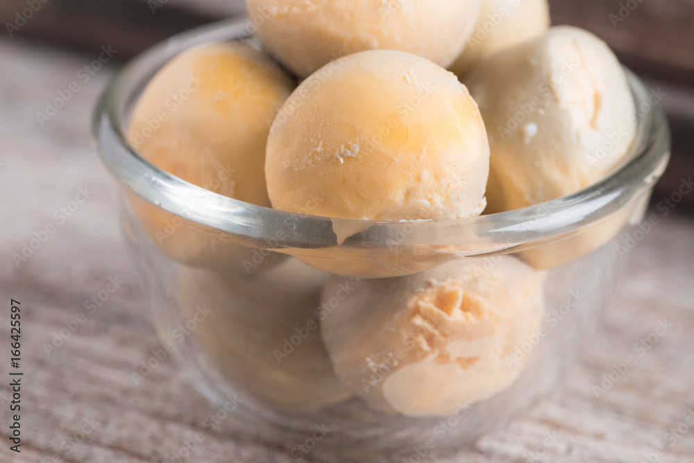 Peeled boiled egg yolk on wood background Peeled boiled egg yolk on wood background