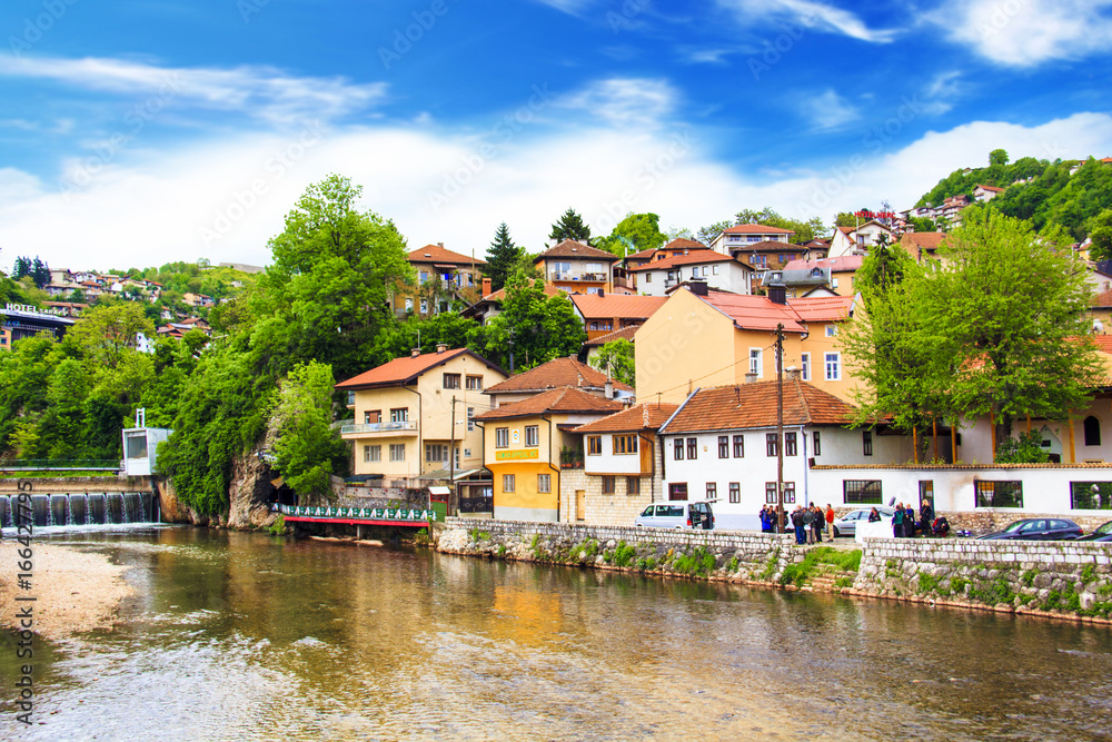 View of the architecture and embankment of the Milyacki River in the historical center of Sarajevo, Bosnia and Herzegovina on JUNE 12, 2016 in Sarajevo.