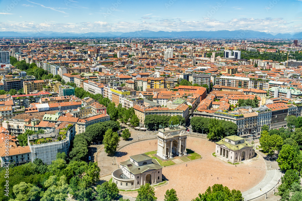 Cityscape of Milan - aerial view from the Branca Tower (Torre Branca) of the Sempione square (Piazza Sempione), with the Arch of Peace (Arco della Pace), Milan Italy