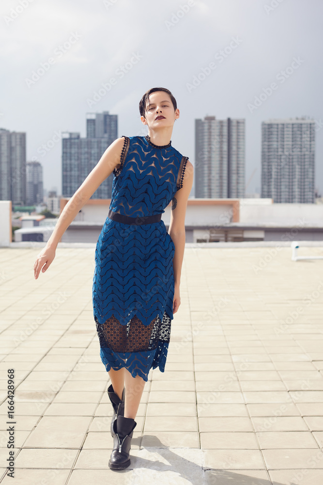 Fashion Female model showing blue dress for shooting Fashion Female model showing blue dress for shooting