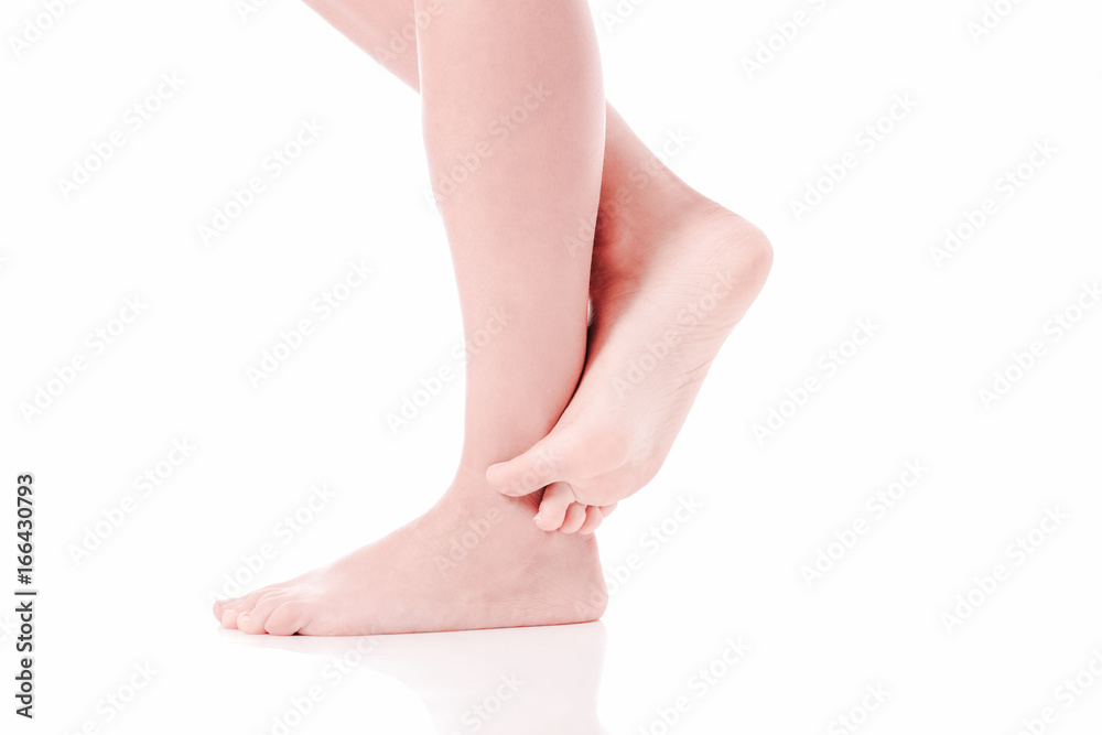 Women's feet on white background. Women's feet on white background.
