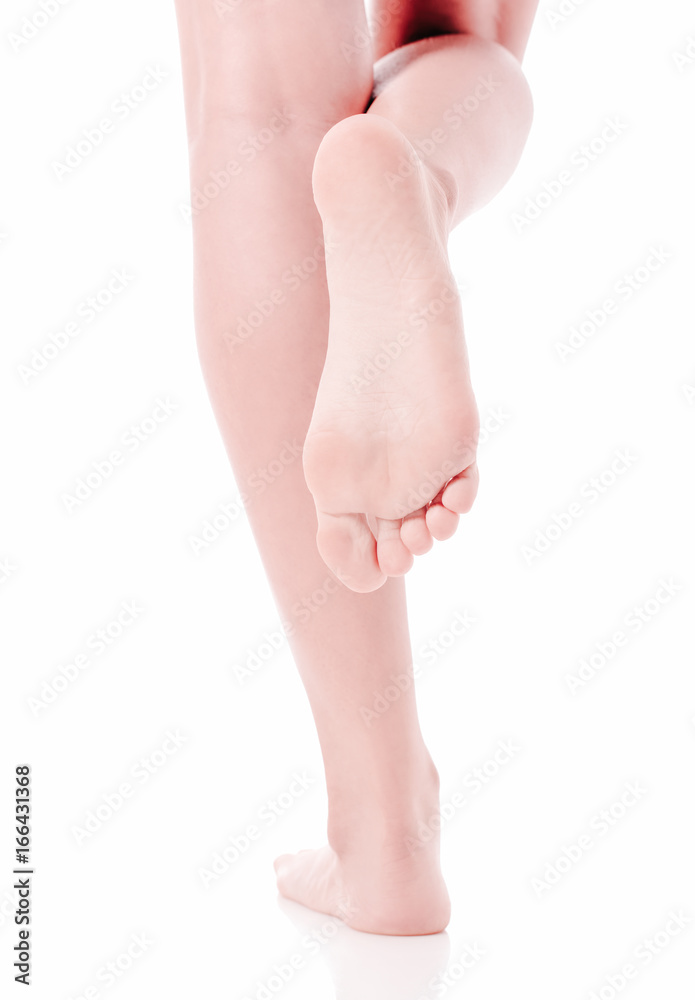 Women's feet on white background. Women's feet on white background.