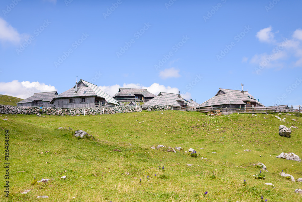 Velika planina plateau, Slovenia, Mountain village in Alps, wooden houses in traditional style, popular hiking destination