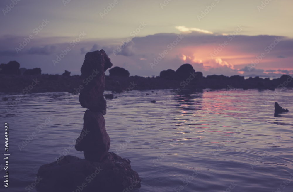 Sunset on the rocky shore