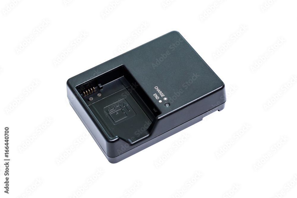 Charger for camera battery. Isolated on white background with clipping path Charger for camera battery. Isolated on white background with clipping path