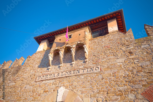 Ancient medieval gate in the city walls of Arezzo, Tuscany photo