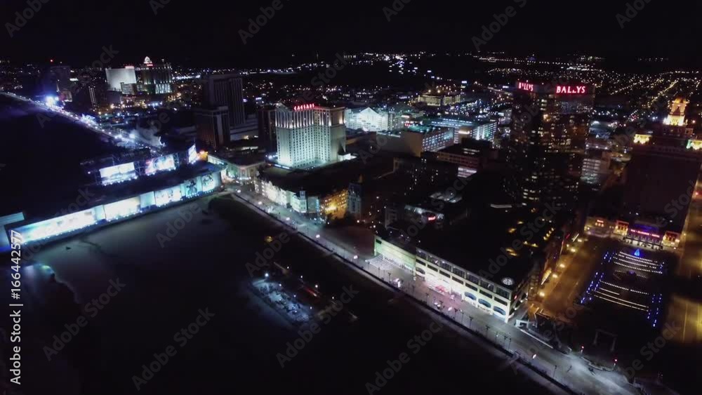 Aerial. Atlantic City, NJ. Night. Flying near сasino resorts. 4K