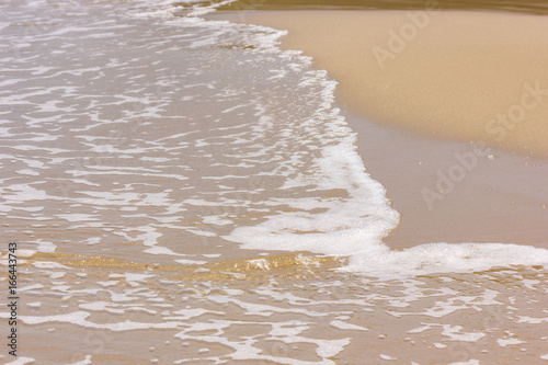  wave on a sandy beach 