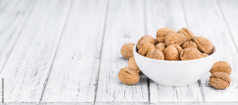 Walnuts (selective focus, close-up shot) Walnuts (selective focus, close-up shot)