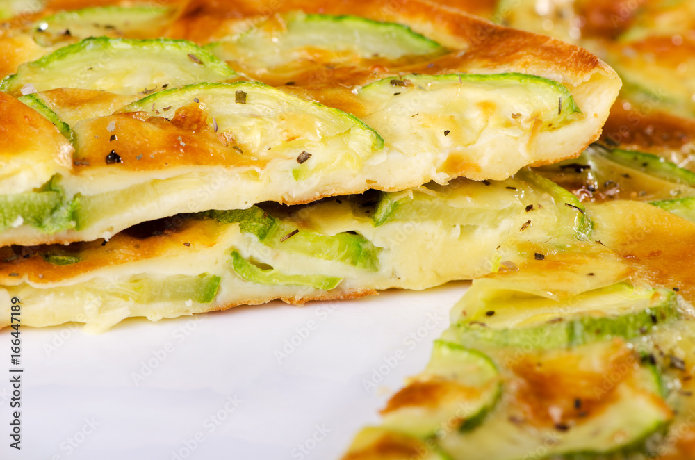 Vegetarian meal, meatless pie with zucchini sectional close-up Vegetarian meal, meatless pie with zucchini sectional close-up