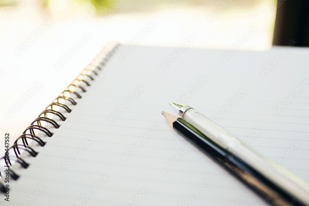 notebook with pencil. time to work. office. paper notebook with pencil. time to work. office. paper