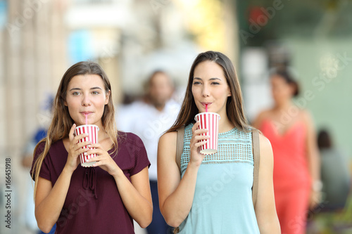 Friends drinking a takeaway refreshment