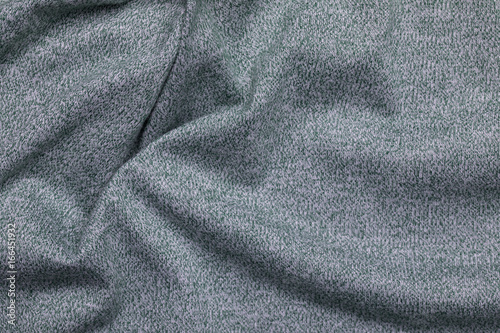 Wavy fabric texture in green, textile surface