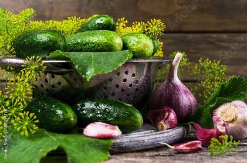 Raw cucumber with spices photo