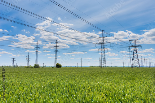 high-voltage power lines at sunset. electricity distribution station. high voltage electric transmission tower