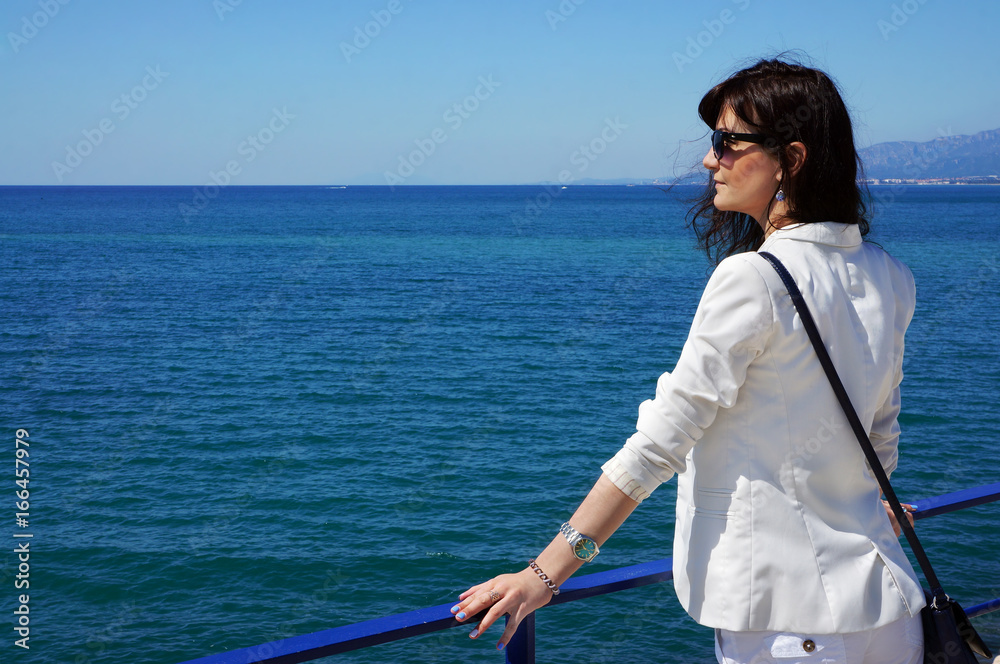Beautiful girl on  holidays in a Spain, Mediterranean sea