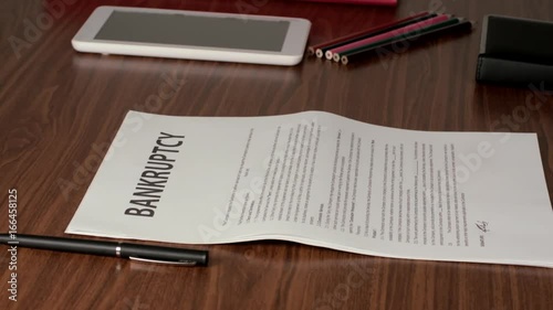 Two Businessmen Meeting For A Handshake And To Sign A Bankruptcy Documents. One Of Them Leaves A Locker For The Other To Take.