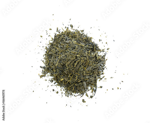 Dry tea with green leaves on white background