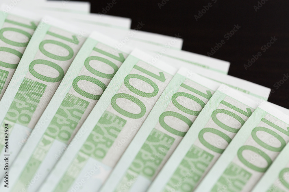 Close-up of 100 Euro banknotes. Shallow dof