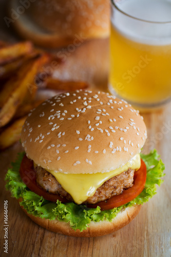  pork hamburger with french fries and beer