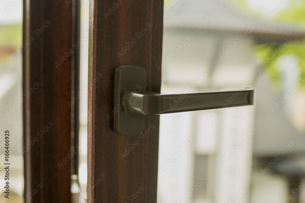 Handle of modern plastic window. Closeup shot Handle of modern plastic window. Closeup shot