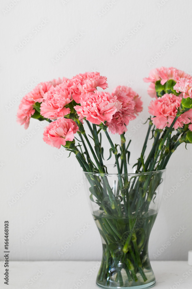 Bouquet of carnation in a glass