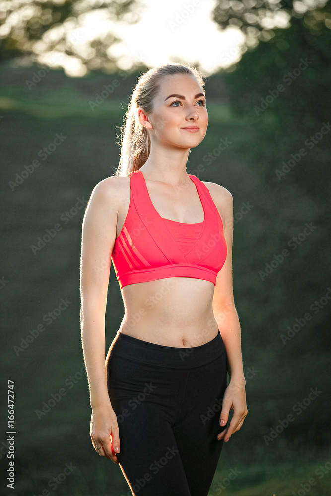 ealthy sports lifestyle. Athletic young woman in sports dress doing fitness exercise. Fitness woman. ealthy sports lifestyle. Athletic young woman in sports dress doing fitness exercise. Fitness woman.