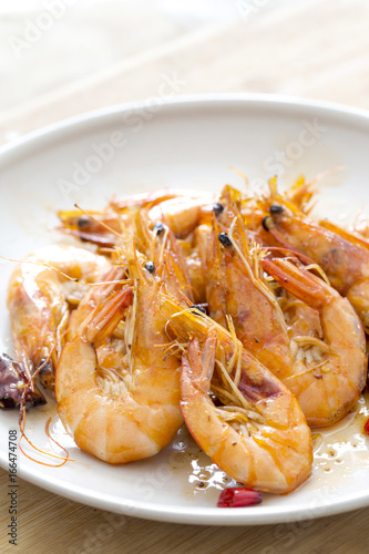 Delicious seafood shrimp closeup on a plate.