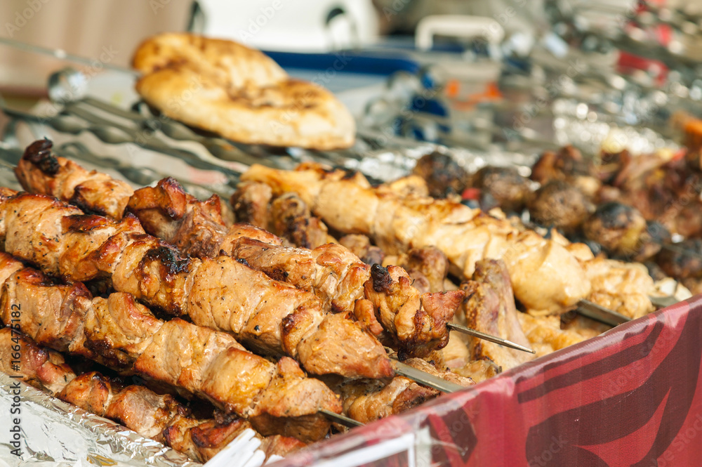 Kebab meat on a metal skewers, selective focus