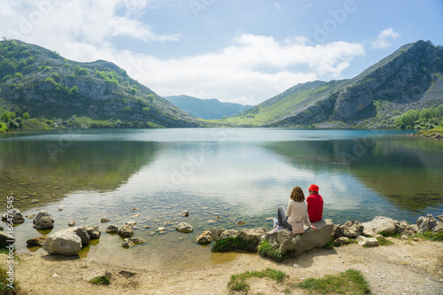 Beautiful nature of Spain: Covadonga mountain lakes in summer sunny day with blue sky and clouds photo