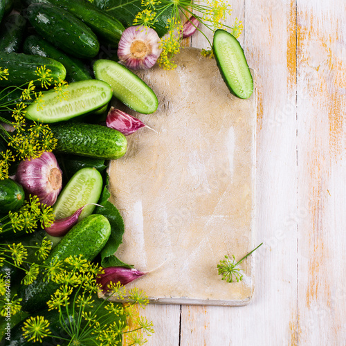 Raw cucumber with spices photo