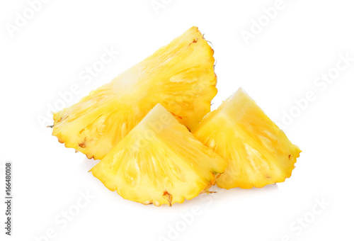 Slices of Fresh pineapple fruits isolated on white background.