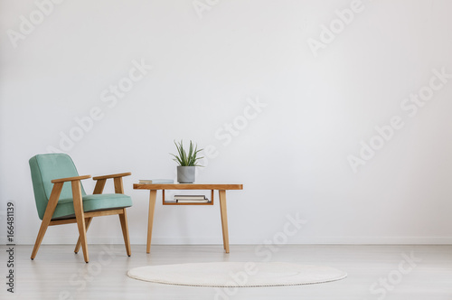 Table with plant and books