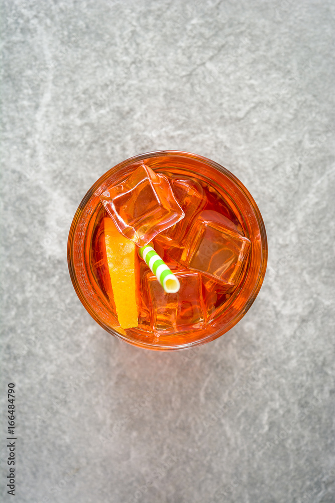Aperol spritz cocktail in glass on gray stone
Aperol spritz cocktail in glass on gray stone