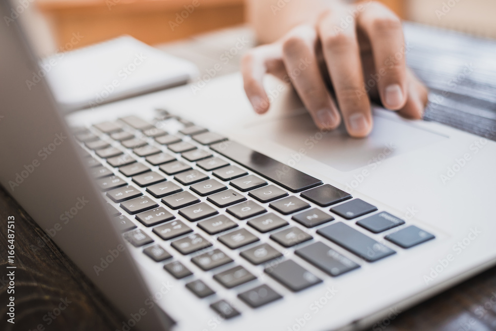 Morning business male. Male hands working on a laptop. Horizontal frame Morning business male. Male hands working on a laptop. Horizontal frame