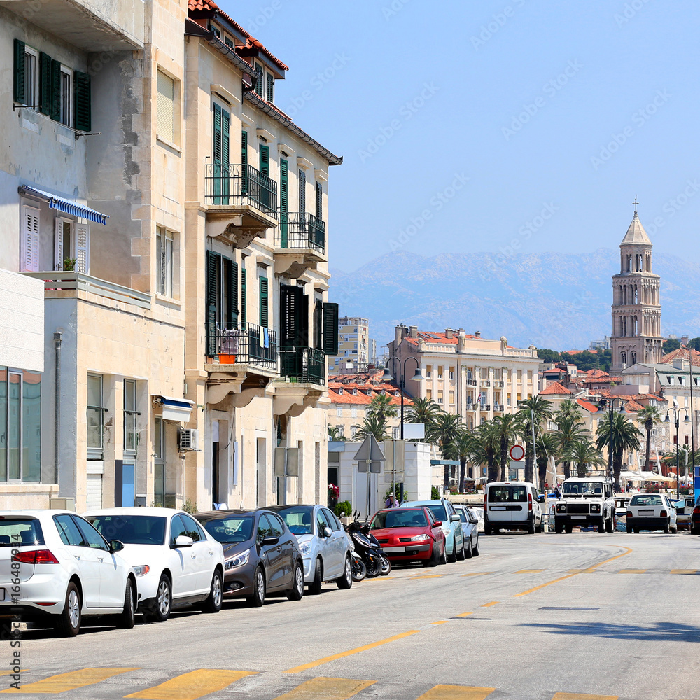 Eclectic mix of historic and modern architecture in Split, Croatia. Saint Domnius bell tower in the background. Split is popular travel destination and UNESCO World Heritage Site. 
