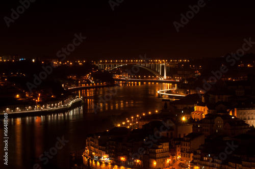 Night view on the Porto city in Portugal and the Duoro river