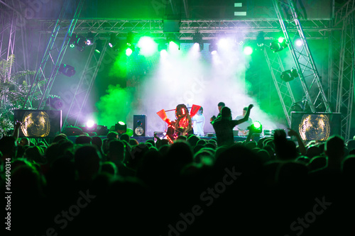 Crowd at concert and blurred stage lights