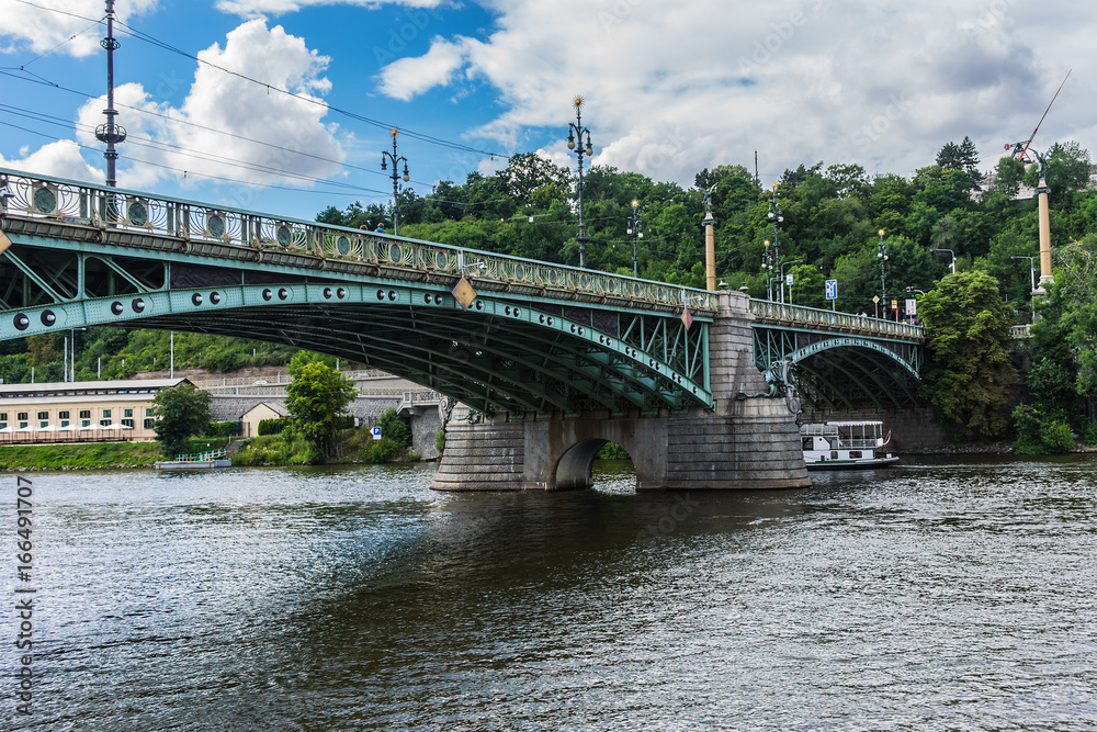 Art Nouveau style Svatopluk Cech Bridge (Most Svatopluka Cecha) over the Vitava River in Prague, Czech Republic. Svatopluk Cech Bridge: length is 169 m and width is 16 m.