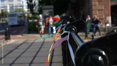 Wallpaper Mural Bright colorful banners blowing in slow motion on black hand rails Torontodigital.ca