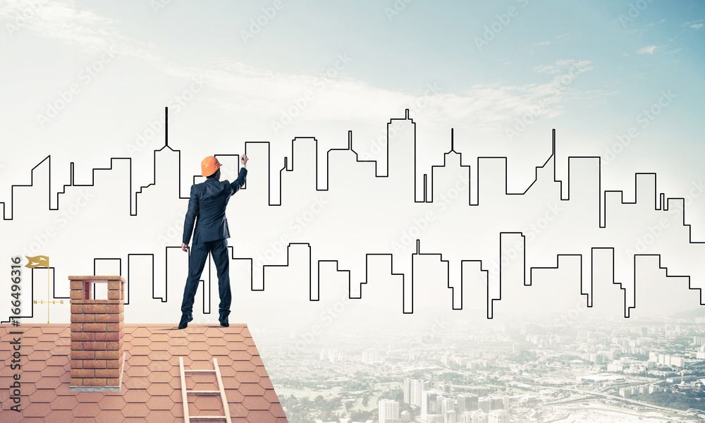 Man architect draw silhouette of modern city on blue sky. Mixed Man architect draw silhouette of modern city on blue sky. Mixed
