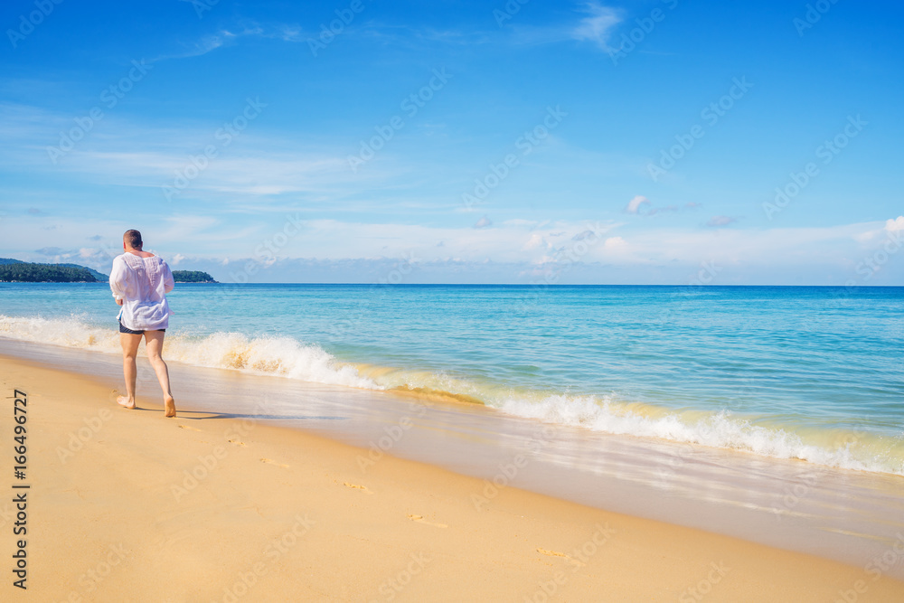 Beach with white sand and blue sea and sky in summer season Beach with white sand and blue sea and sky in summer season