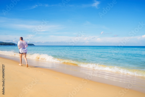 Beach with white sand and blue sea and sky in summer season