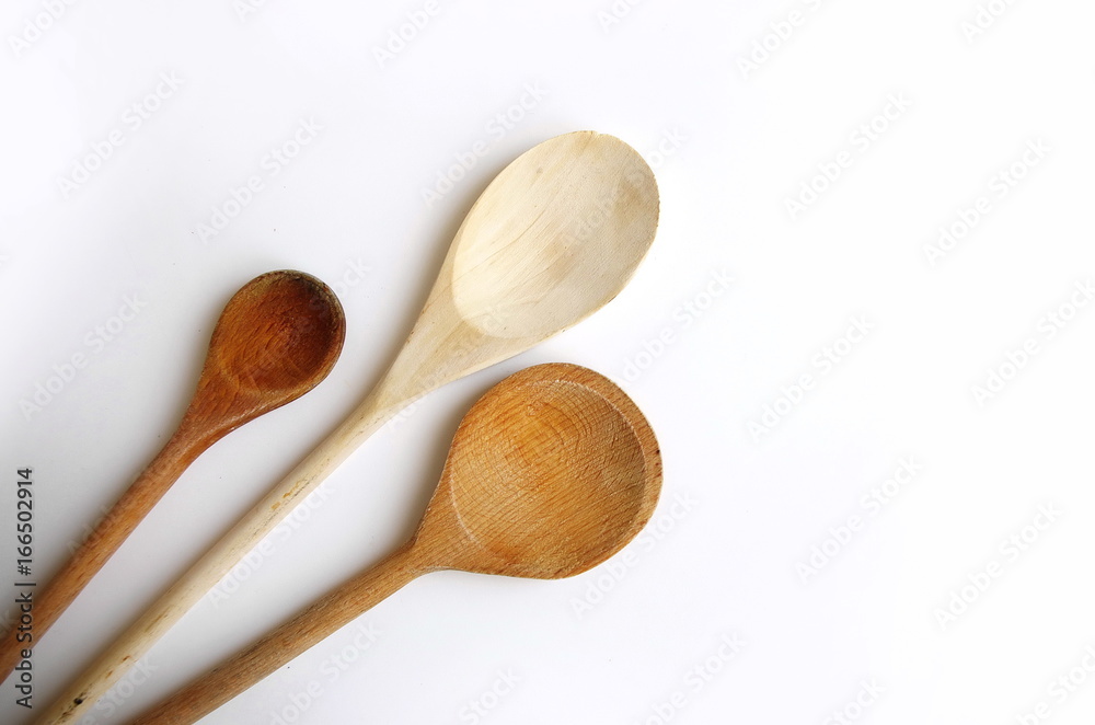 Set of wooden kitchen spoon isolated on white background. Cooking concept kitchen background. Set of wooden kitchen spoon isolated on white background. Cooking concept kitchen background.