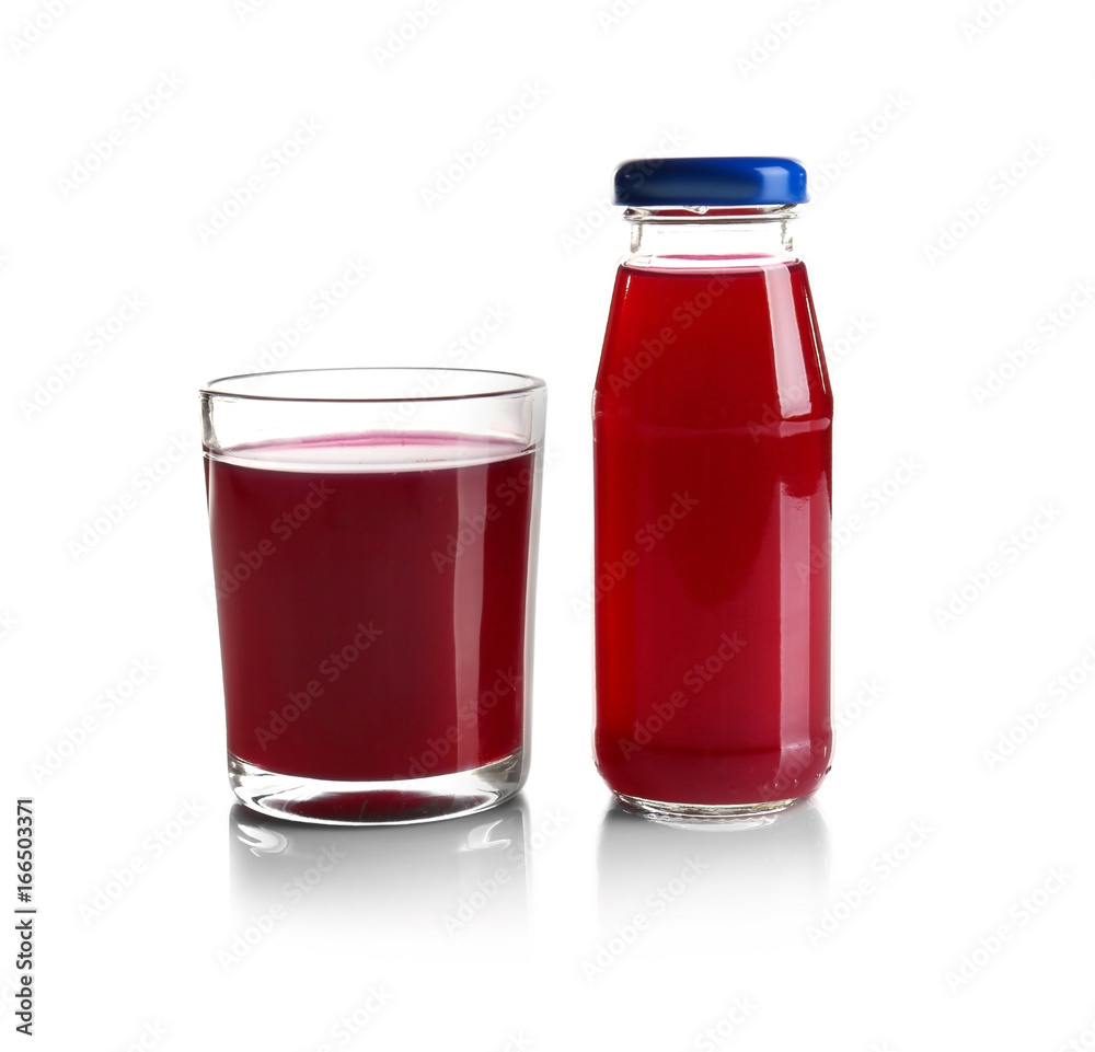 Bottle and glass with delicious juice on white background Bottle and glass with delicious juice on white background
